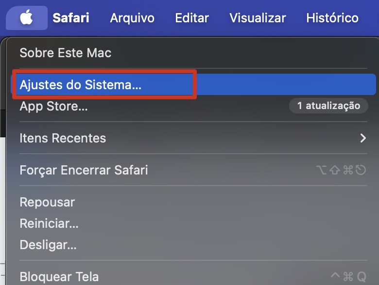 O menu Apple em um Mac, com Ajustes do Sistema destacado. Como corrigir a Touch Bar no MacBook Pro: acesse as configurações da Touch Bar.