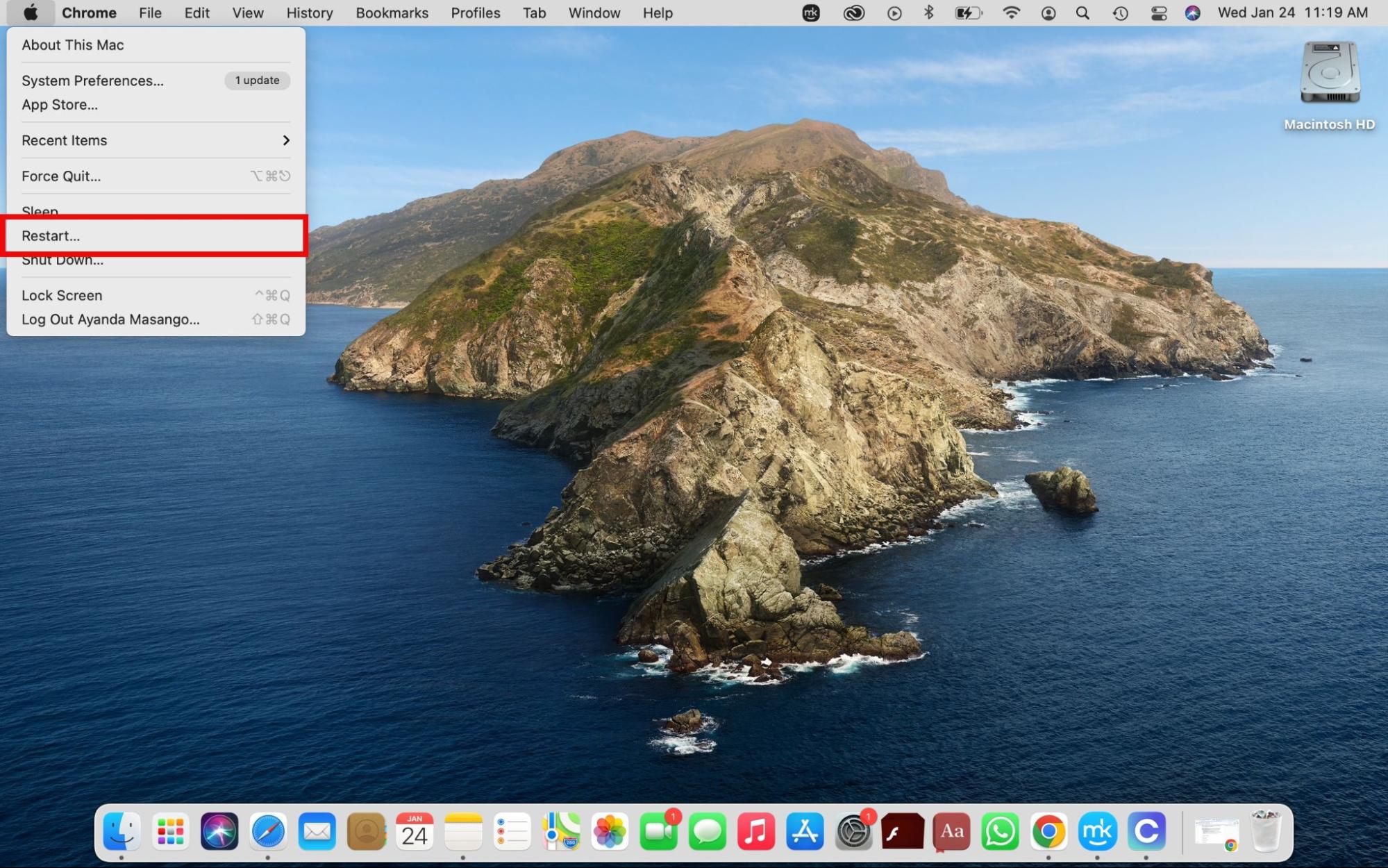 The Apple menu is opened on a Mac. Restart your MacBook when you’ve received the A software update is required to use this startup disk message.