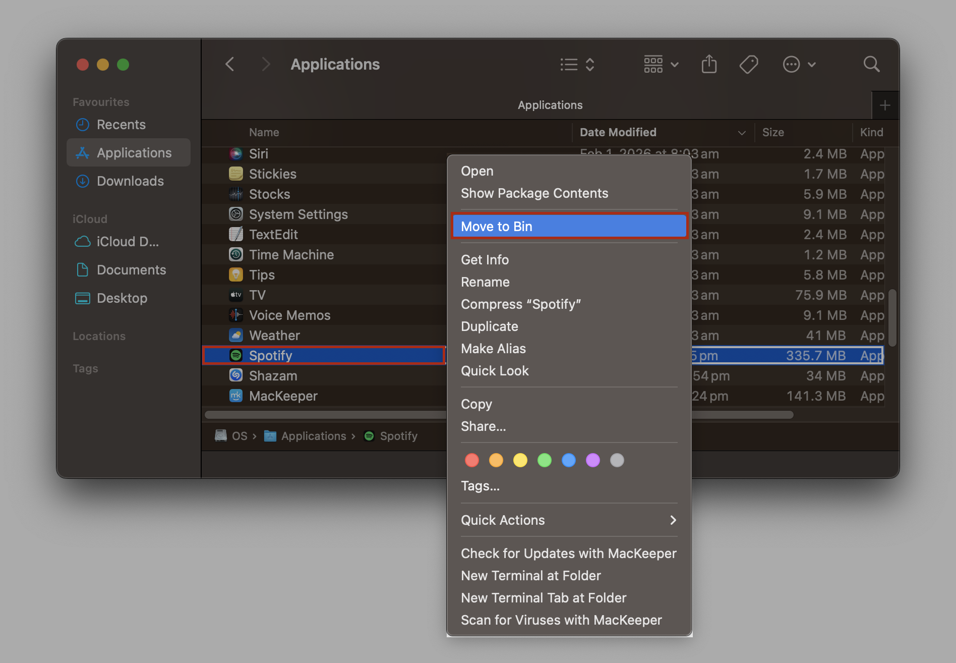Applications folder open in Finder on macOS with a right-click context menu showing Move to Bin highlighted for the Spotify app.