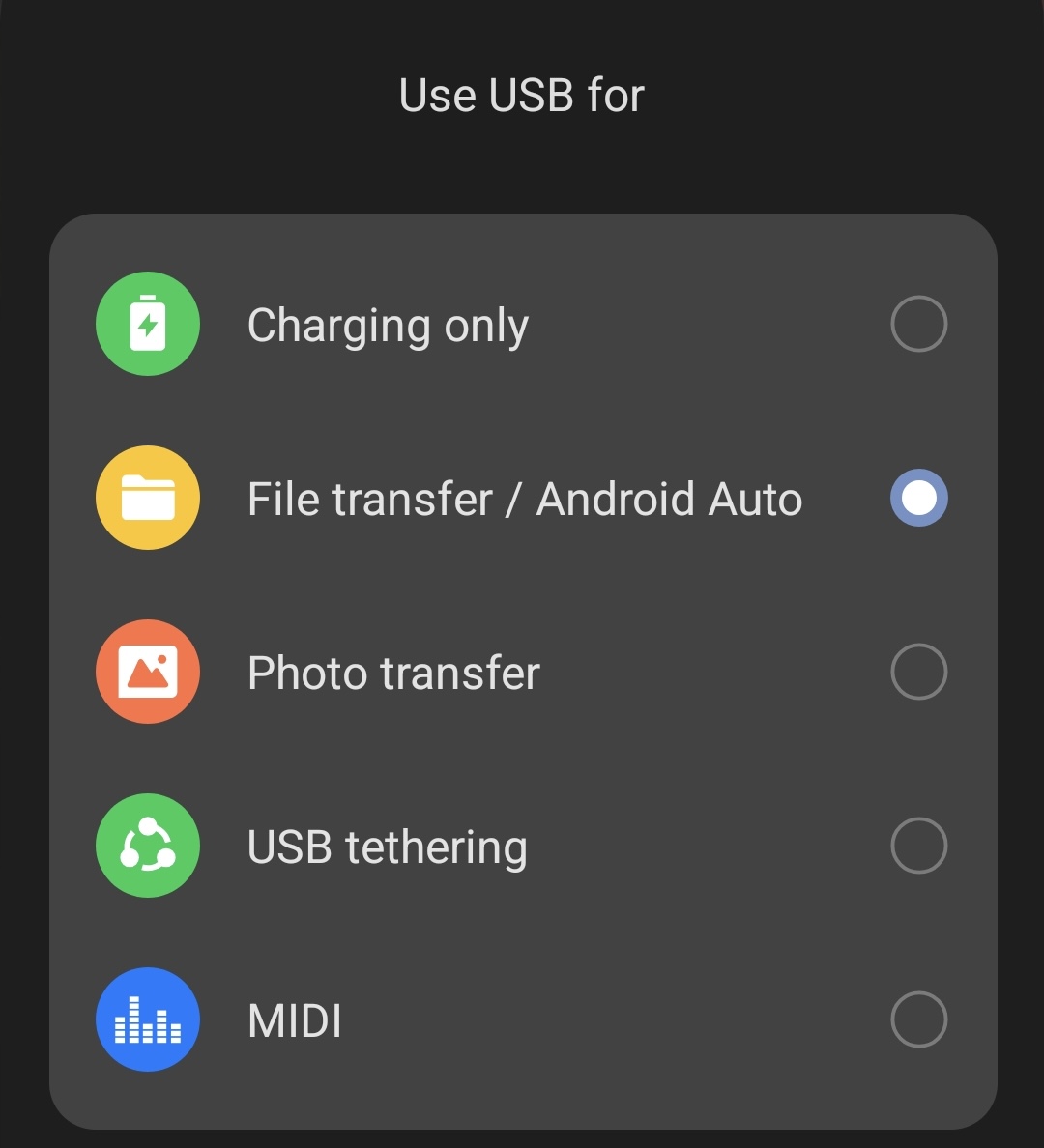 You'll see a lot of USB options. This will vary by device, but normally it will include charging only, photo transfer, and file transfer or MTP. Select the file transfer / MTP option.
