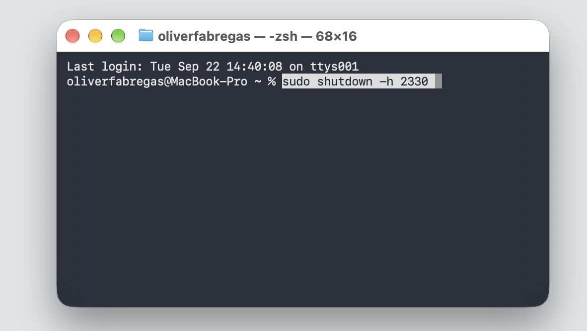 Terminal window on a MacBook with sudo shutdown -h 2330 typed to schedule a one-time shutdown at the exact clock time of 11:30 PM on macOS.