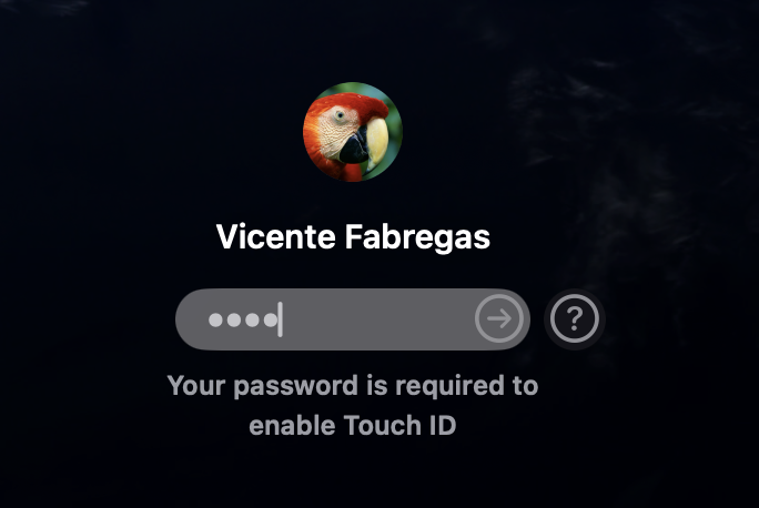 Password entry field shown on the macOS login screen of an Apple laptop, where the user types the password and presses Return to sign in.