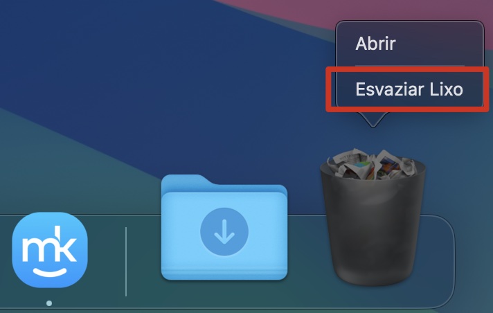 Parte do Dock em um Mac, com a Lixeira selecionada. O menu de contexto está aberto e Esvaziar Lixo está selecionado. Como eliminar o cache do Mail no Mac.
