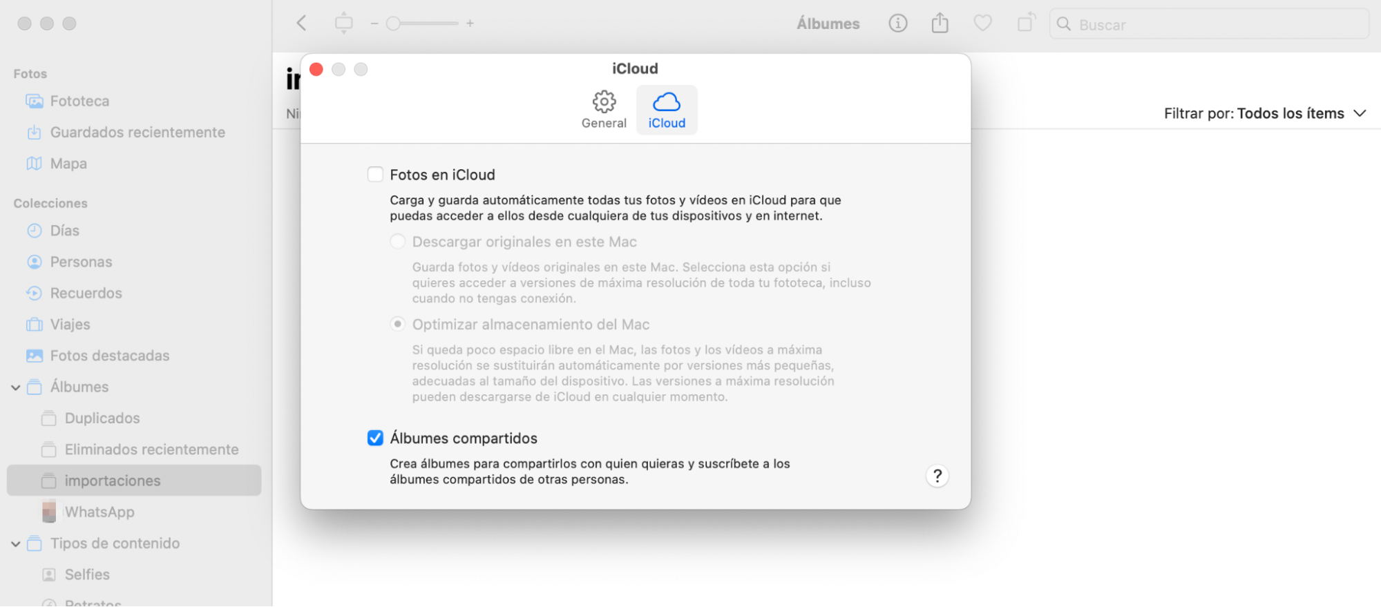 Ahora, en el menú emergente, haz clic en iCloud y luego en Descargar originales para el almacenamiento de fotos de Mac. Ahora podrás almacenar todas tus imágenes en tu biblioteca de fotos preferida.