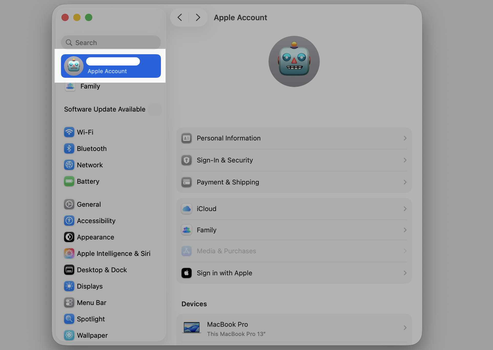 System Settings on a MacBook with the user's Apple Account name at the top left of the sidebar selected to reach iCloud sync options.