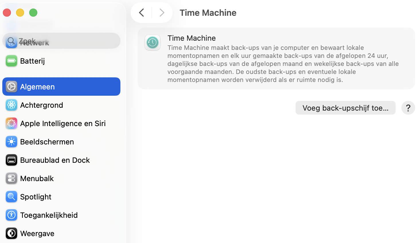 In de Time Machine-instellingen zie je welke reservekopieën al zijn ingesteld. Om een nieuwe reservekopie te starten, klik je op Voeg reservekopieschijf toe.