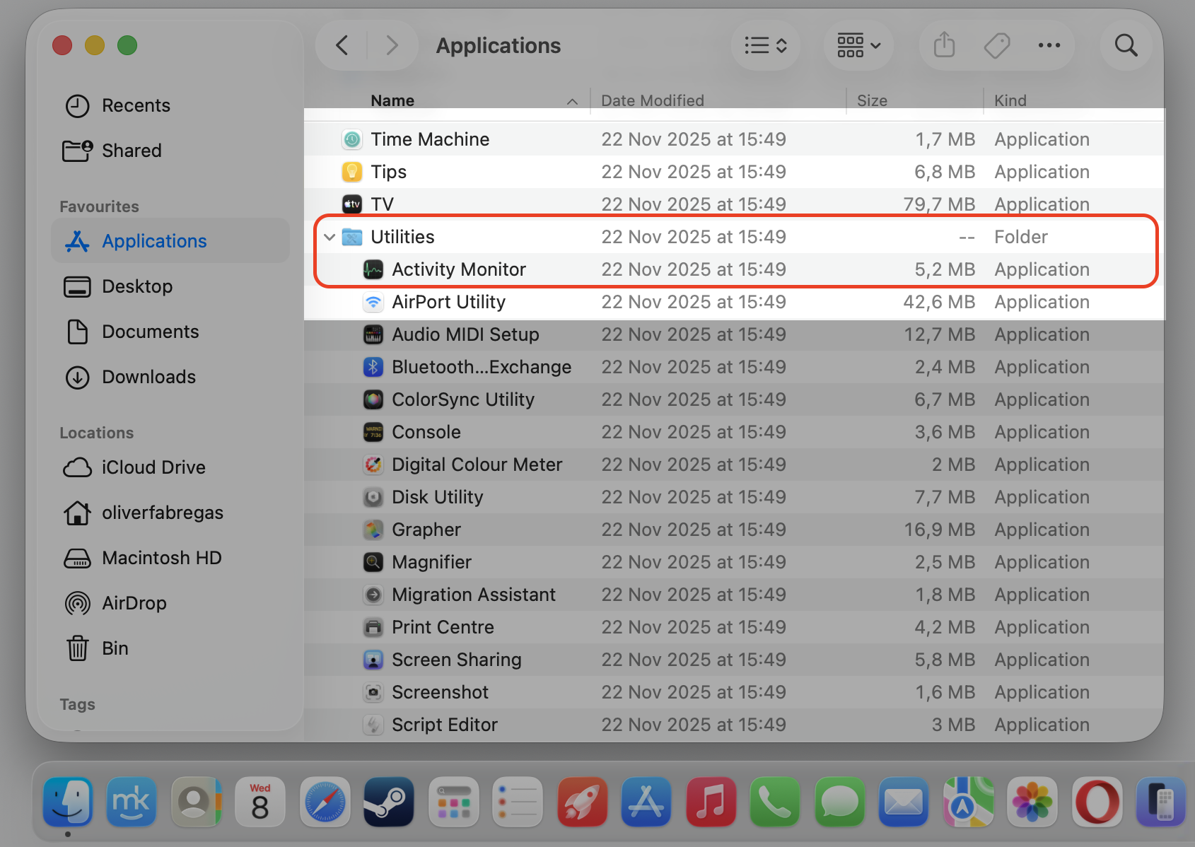 Finder Applications window on an Apple laptop with the Utilities folder expanded and Activity Monitor selected to inspect sentineld high CPU.