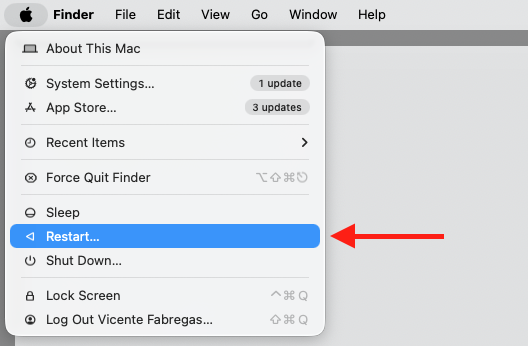 Selecting Restart from the Apple menu in the top-left corner of macOS to clear the stuck backgroundshortcutrunner process on a MacBook.