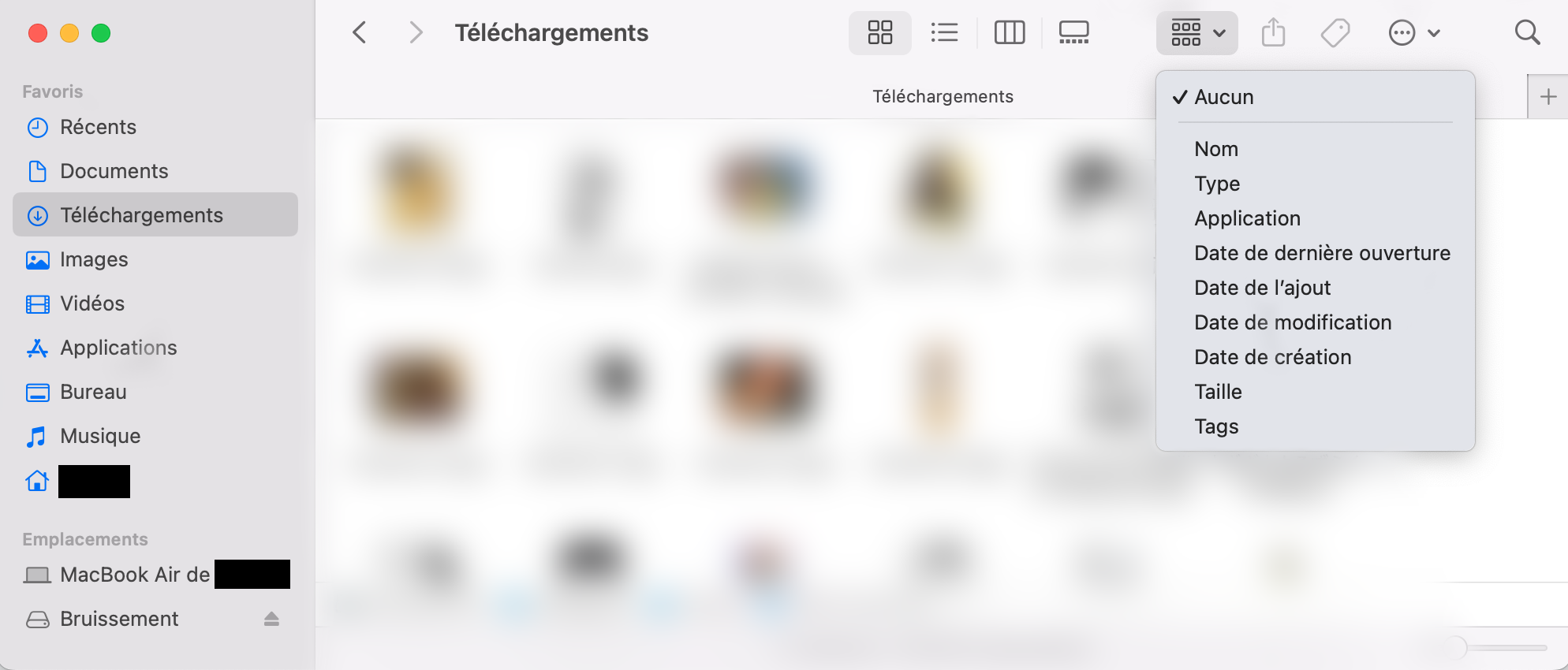 Si vous cherchez une photo particulière, vous pouvez cliquer sur l’icône Grouper. Une fois celle-ci sélectionnée, cliquez sur Type dans le menu déroulant.