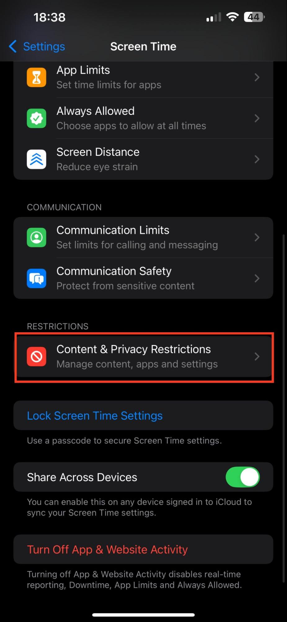 Screen Time restrictions can cause AirDrop to wait when sending to Mac. To fix this, select Content & Privacy Restrictions in Screen Time settings.