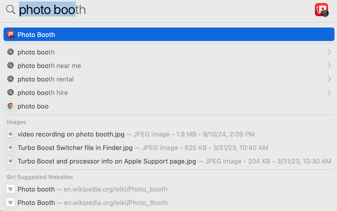 Spotlight search is opened on a Mac. Type photo booth and select it to open the camera on a Mac if you want to take quick, fun photos.