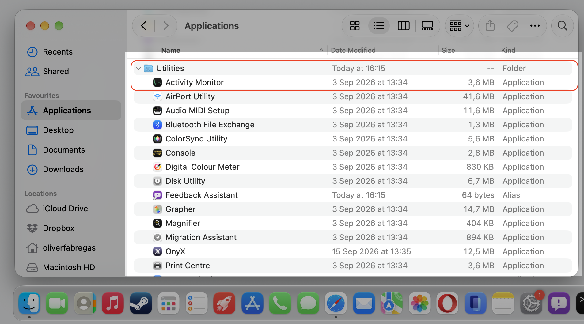 The Utilities folder in Finder on an Apple laptop, with Activity Monitor highlighted so you can catch leftover Atlas processes.