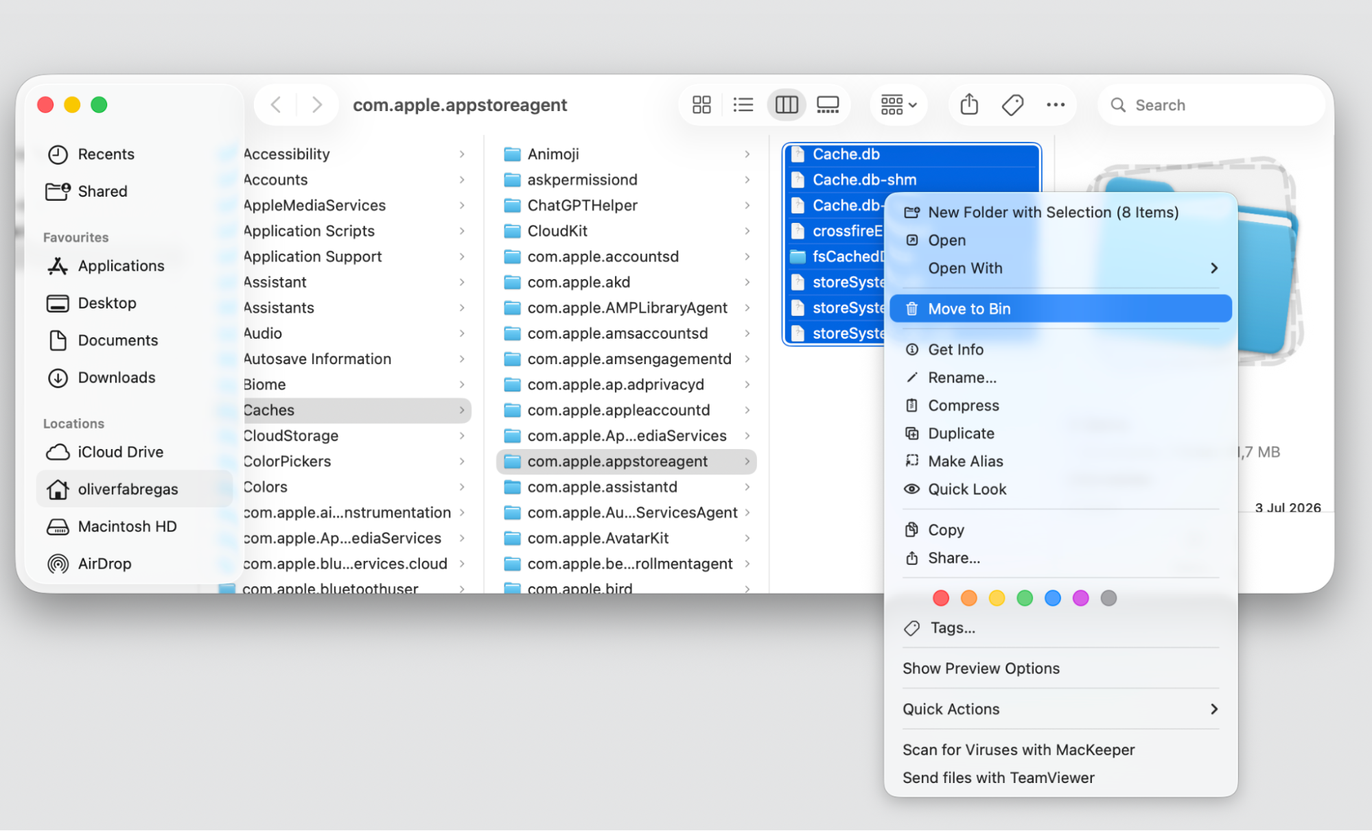 App Store cache folder on macOS with all files selected and moved to the Bin to stop installd retrying on an Apple computer.