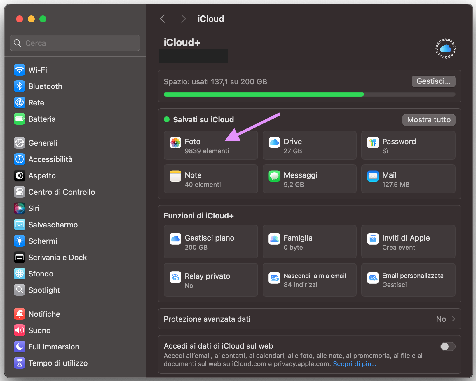 Impostazioni di Sistema su Mac mostra il menu iCloud. Fai clic su Foto per impostare la sincronizzazione e spostare i file da un Mac all’altro con lo spazio di archiviazione iCloud.