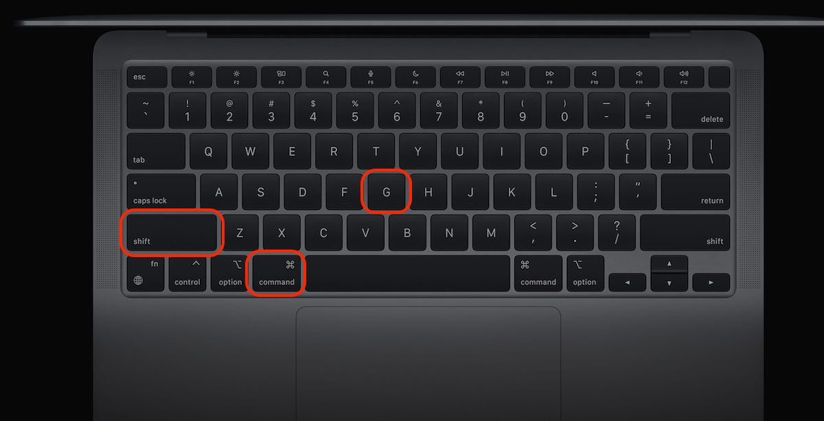 The Finder application is open on a Mac, displaying the Go to Folder search bar on the screen.