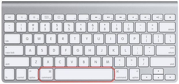 An Apple keyboard with the Command and Space keys highlighted to open Spotlight and find Keychain items for the damaged OneDrive on Mac.