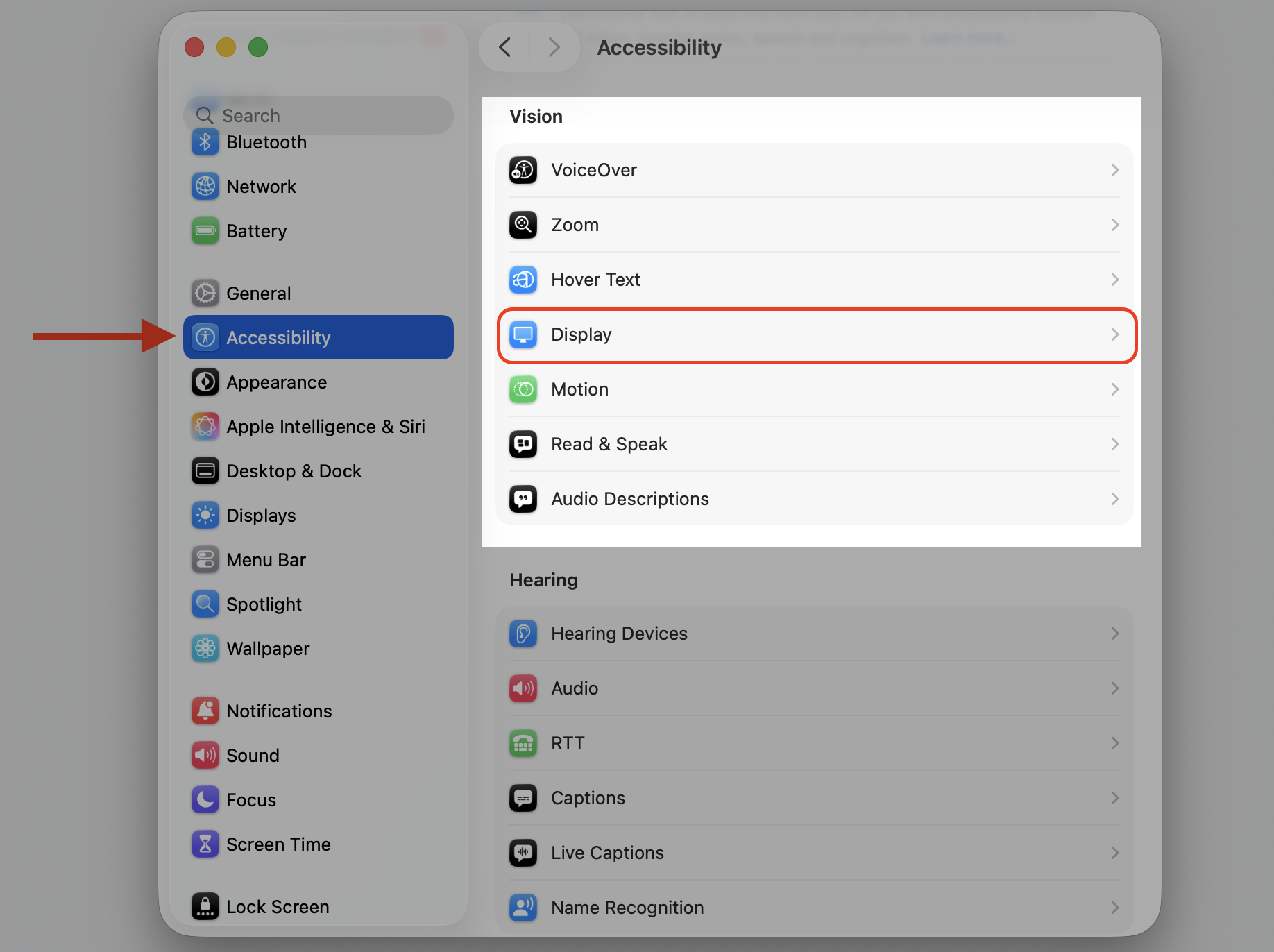 Accessibility section in macOS Tahoe System Settings on an iMac with Display selected to reach transparency and motion controls.