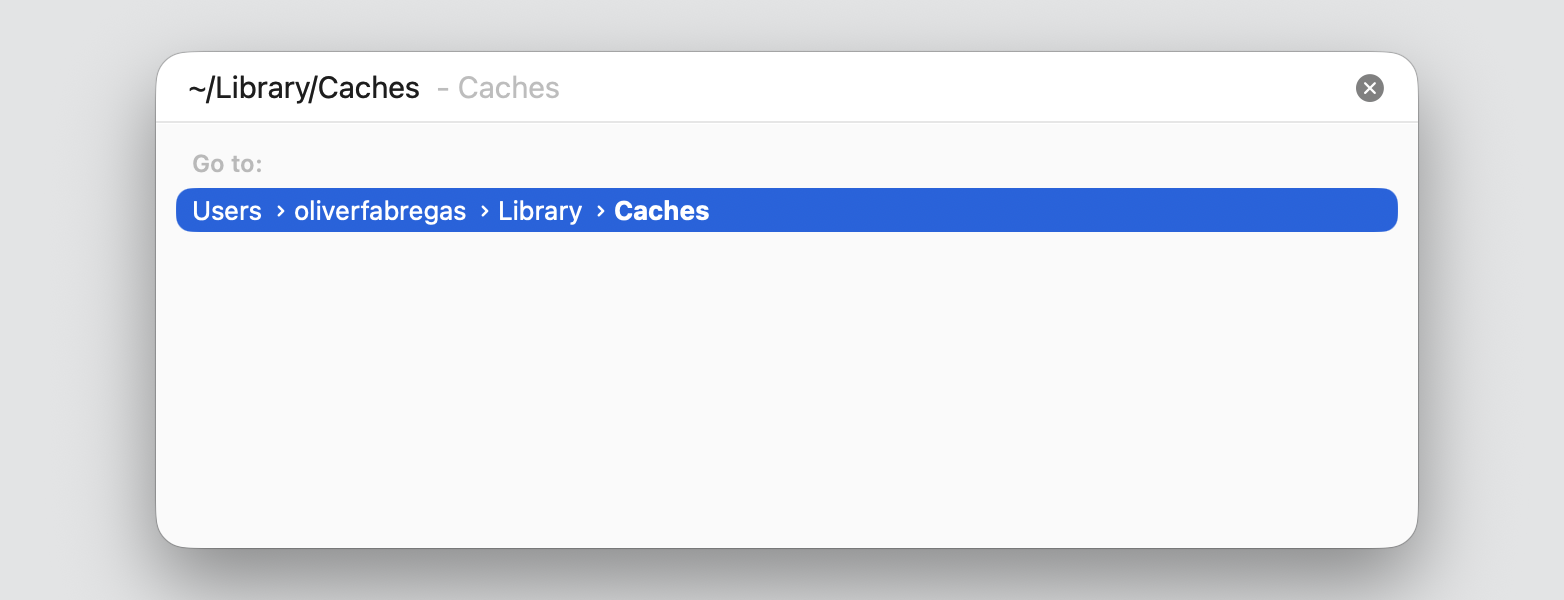 The Go to Folder box in Finder on a MacBook with ~/Library/Caches typed in to find cache files for a Mac app won't open.