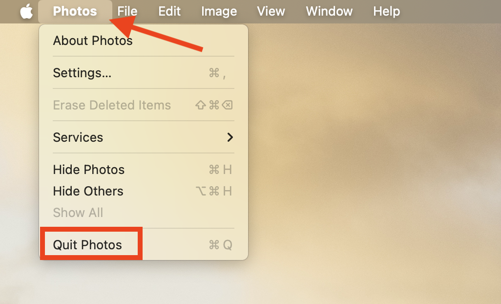 The Quit option in the File menu for Photos on Mac. After syncing your second Photos library to the cloud, quit the app then open your primary library to merge the two photo libraries into one in iCloud.