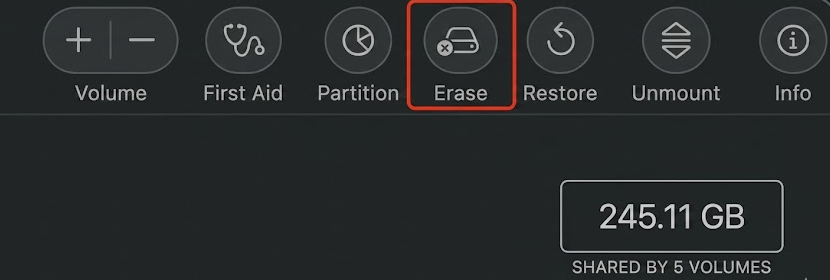 Disk Utility in macOS Recovery on a Mac desktop with Macintosh HD selected and the Erase button clicked to wipe the startup volume.